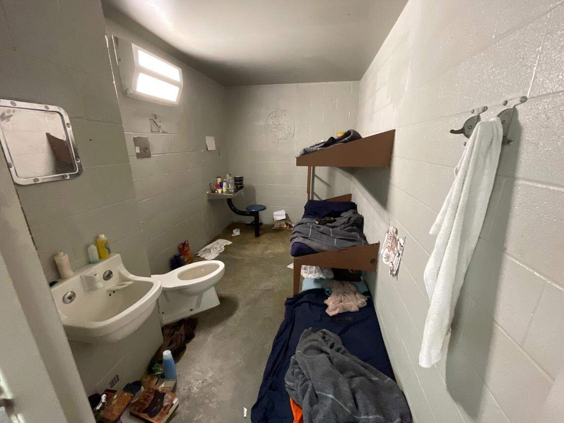 A cell in the Platte County jail has two bunk beds and a mattress on the floor for a third person.