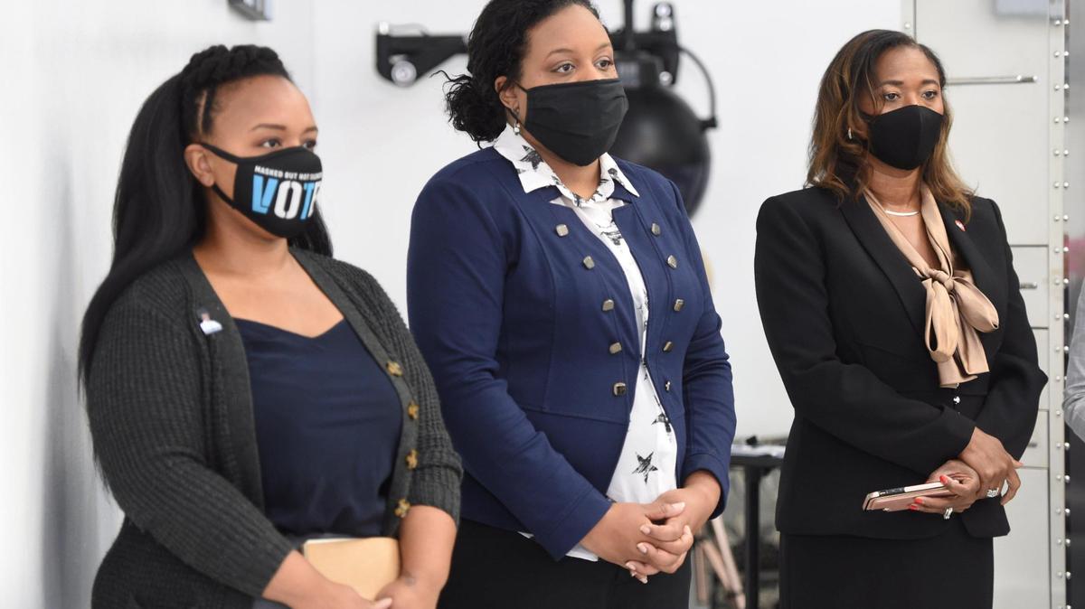 Michele Watley, from left, of Shirley’s Kitchen Cabinet, and Kansas City Councilwomen Melissa Robinson and Ryana Parks-Shaw are pictured at Plush Life Beauty Lounge encouraging Kansas City leaders to pass the CROWN Act. Kansas City passed the measure in 2020.