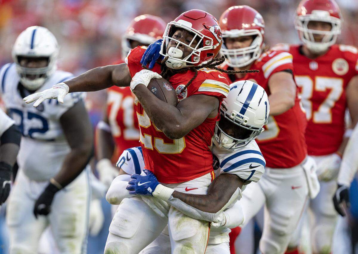 Kansas City Chiefs running back Kareem Hunt (29) rushes late in the second half as Indianapolis Colts cornerback Sauce Gardner (1) slows him on Sunday, Nov. 23, 2025 at GEHA Field at Arrowhead Stadium in Kansas City. The Chiefs defeated the Colts 23-20 in overtime. 