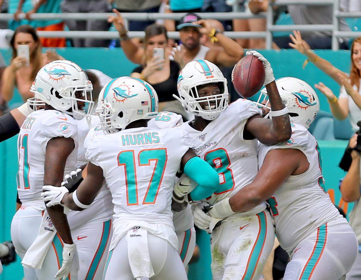 Miami Dolphins receiver Preston Williams (18) celebrates after catching a touchdown in the first quarter against the New York Jets on Sunday, Nov. 3, 2019 at Hard Rock Stadium in Miami Gardens, Fla. (Charles Trainor Jr./Miami Herald/TNS)