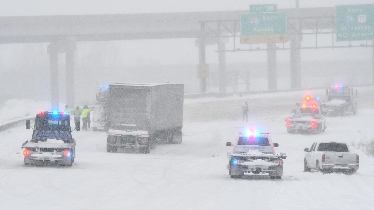 Northbound Interstate 29 near Waukomis Drive in the Northland remains closed as emergency crews work the scene Thursday morning, Feb. 17, 2022, causing a backup. A snow storm brought several inches of snow to the Kansas City area.