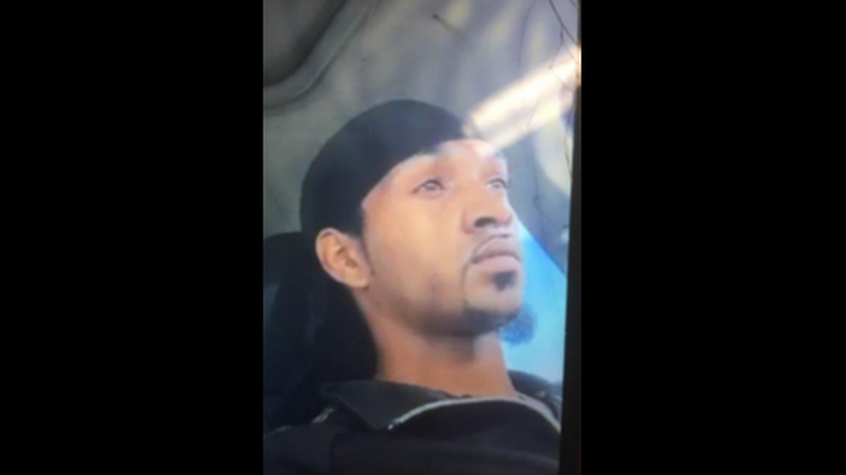 A photo of a man was distributed by police investigating a homicide in Kansas City, Kansas. Police described the man as a person of interest.