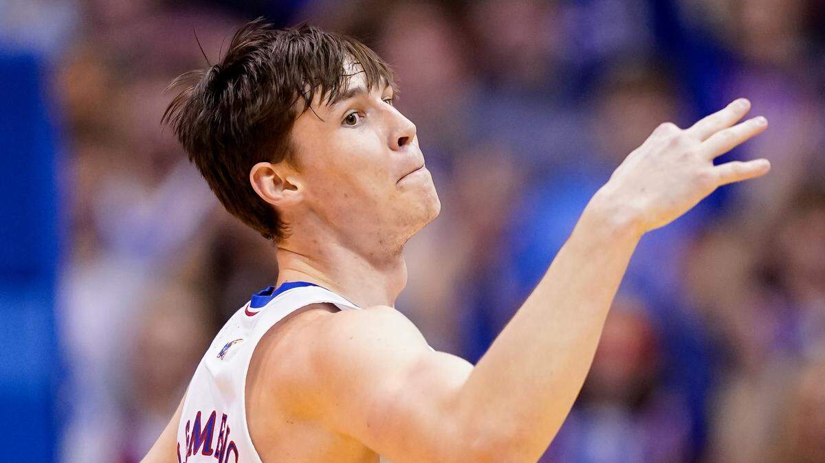 Kansas Jayhawks forward Zach Clemence celebrates a basket against the Oklahoma Sooners during a game at Allen Fieldhouse.