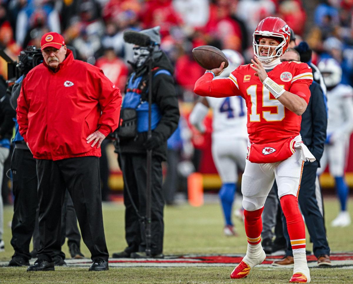 Kansas City Chiefs head coach Andy Reid watches while Kansas City Chiefs quarterback Patrick Mahomes warms up before the AFC Championship Game with the Buffalo Bills on Sunday, Jan. 26, 2025, at GEHA Field at Arrowhead Stadium.