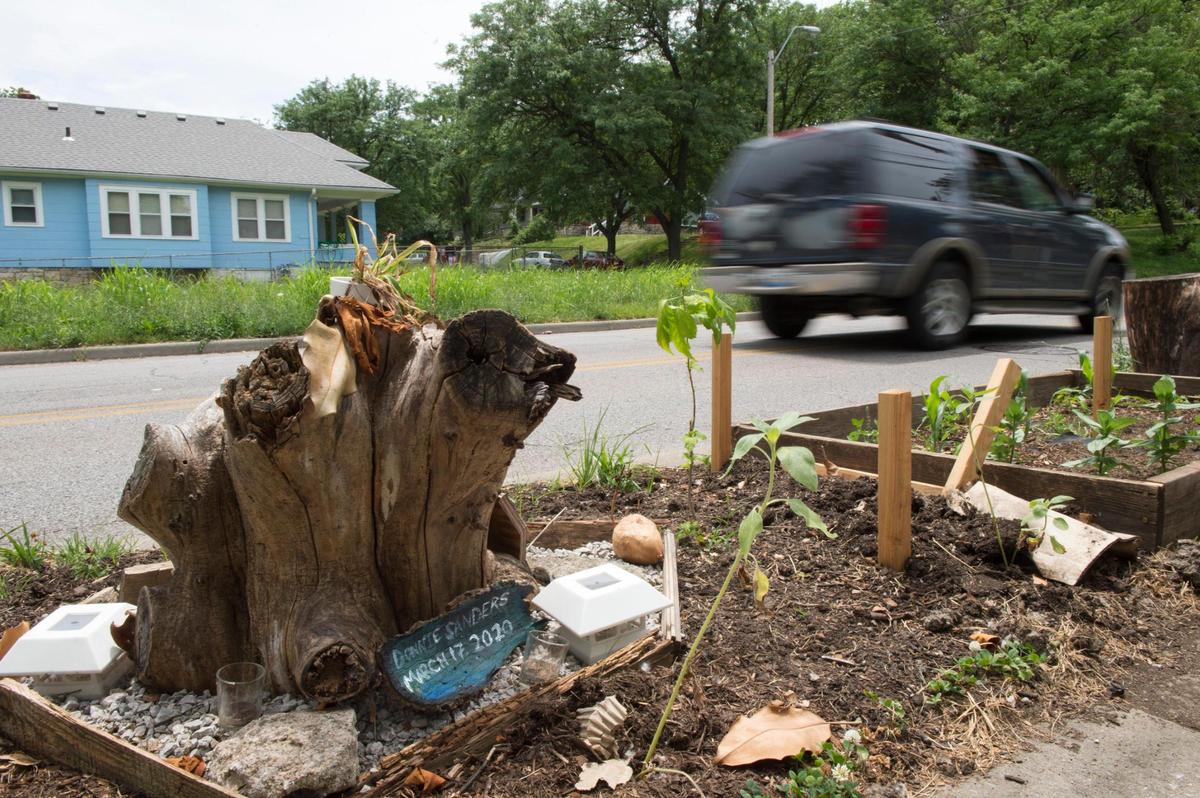 A memorial marks the location near where Donnie Sanders, 47, was pulled over for a traffic violation near 51st Street and Prospect Avenue in Kansas City. Sanders, who was unarmed, was fatally shot in March by a Kansas City police officer after fleeing the traffic stop.