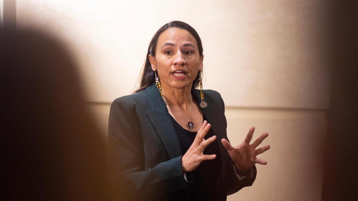 Kansas 3rd District Rep. Sharice Davids talks to supporters at her election watch party Tuesday, Nov. 8, 2022, at the Sheraton Hotel in Overland Park.