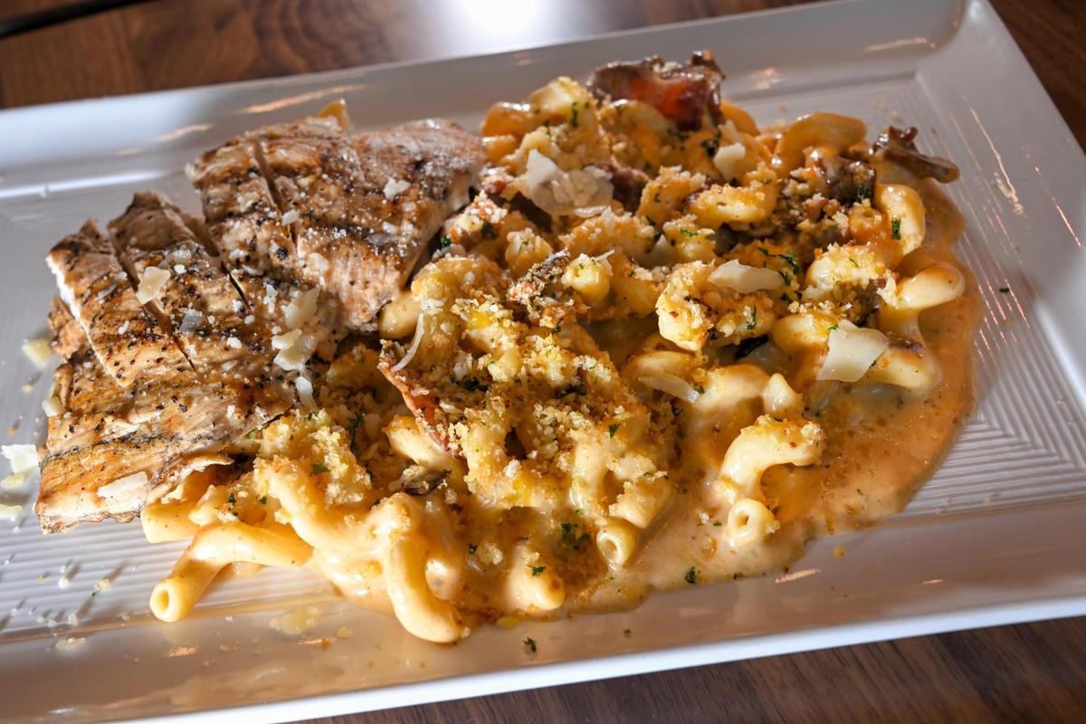 Smoked Gouda Mac with a grilled chicken breast is one of the more popular dishes at Brown & Loe, a sit-down restaurant at Kansas City International Airport’s new terminal.