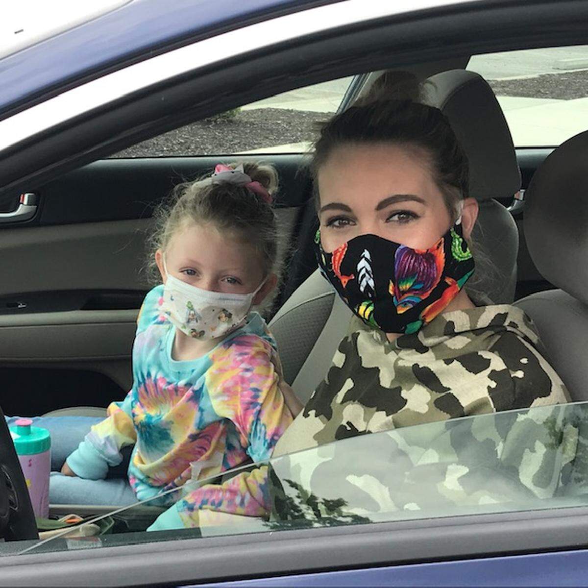 “I feel like a lot of people feel like they’re either invincible or just like this virus isn’t real or it’s passed,” said Taryn Coffman, 26, a certified nursing assistant from Blue Springs with her daughter, Saylor, 6. “But our hospital has been preparing for the surge that didn’t happen, because it’s going to happen now.”