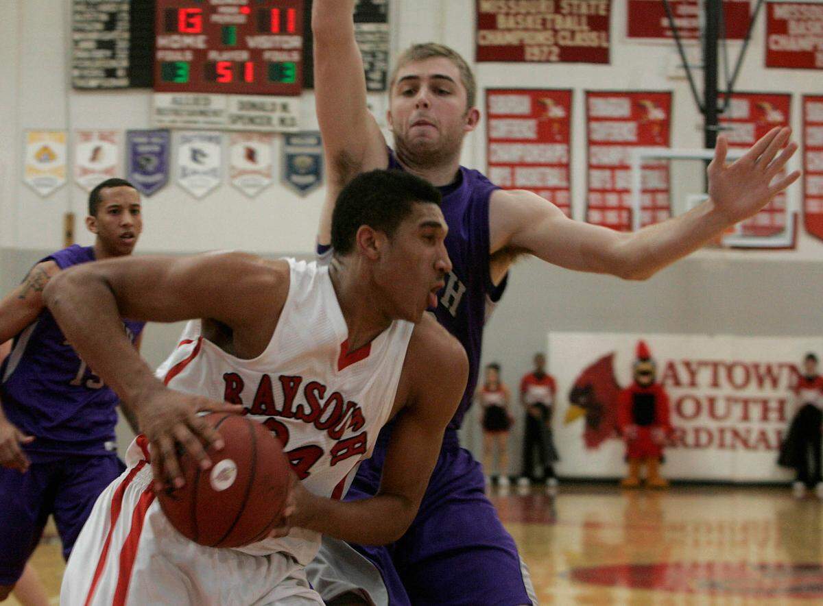 “I want to do basketball camps and it will be a lot of community work because my dad passed the torch down to me,”​ says Ishmail Wainright, seen in 2011 playing for Raytown South High School.