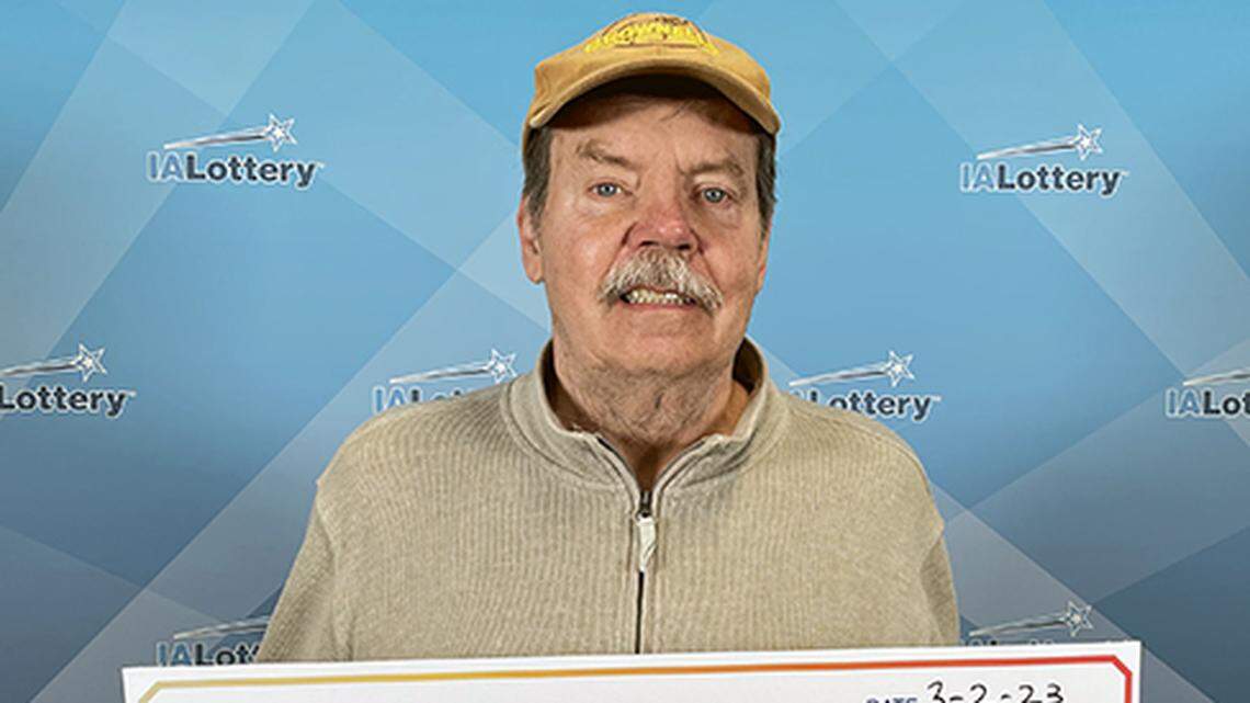 Michael Mettler with his oversized check.