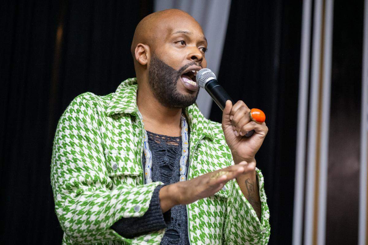 Marquez Beasley serves as MC for Soul Sessions, the longest running open mic night in Kansas City, at Elevation Grille in Raytown. Beasley gives out the rules for the event, keeps the energy high, and introduces each performer.