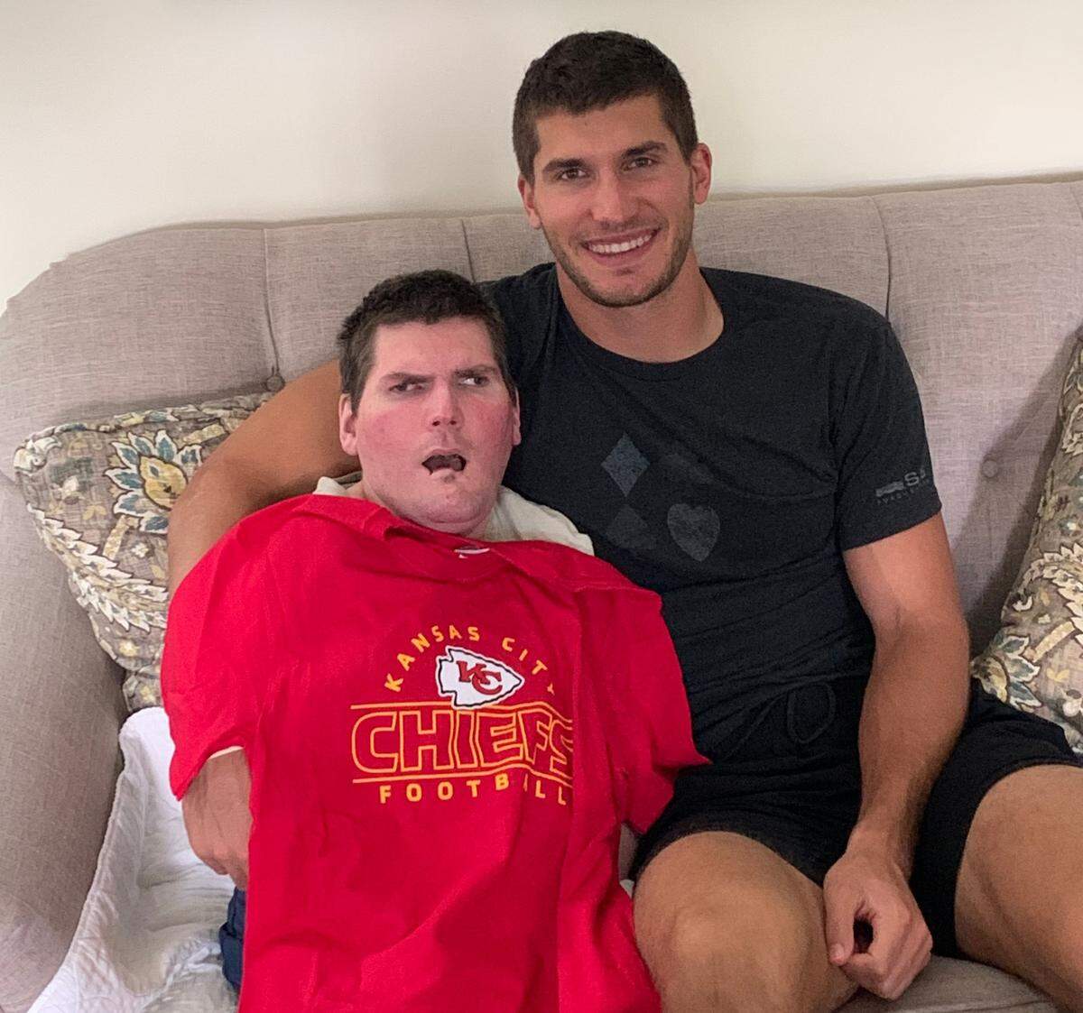 Chiefs receiver Justin Watson, right, has a special relationship with older brother Tommy, who has cerebral palsy. The elder Watson brother inspires Justin to maintain a positive attitude, the NFL wideout says.
