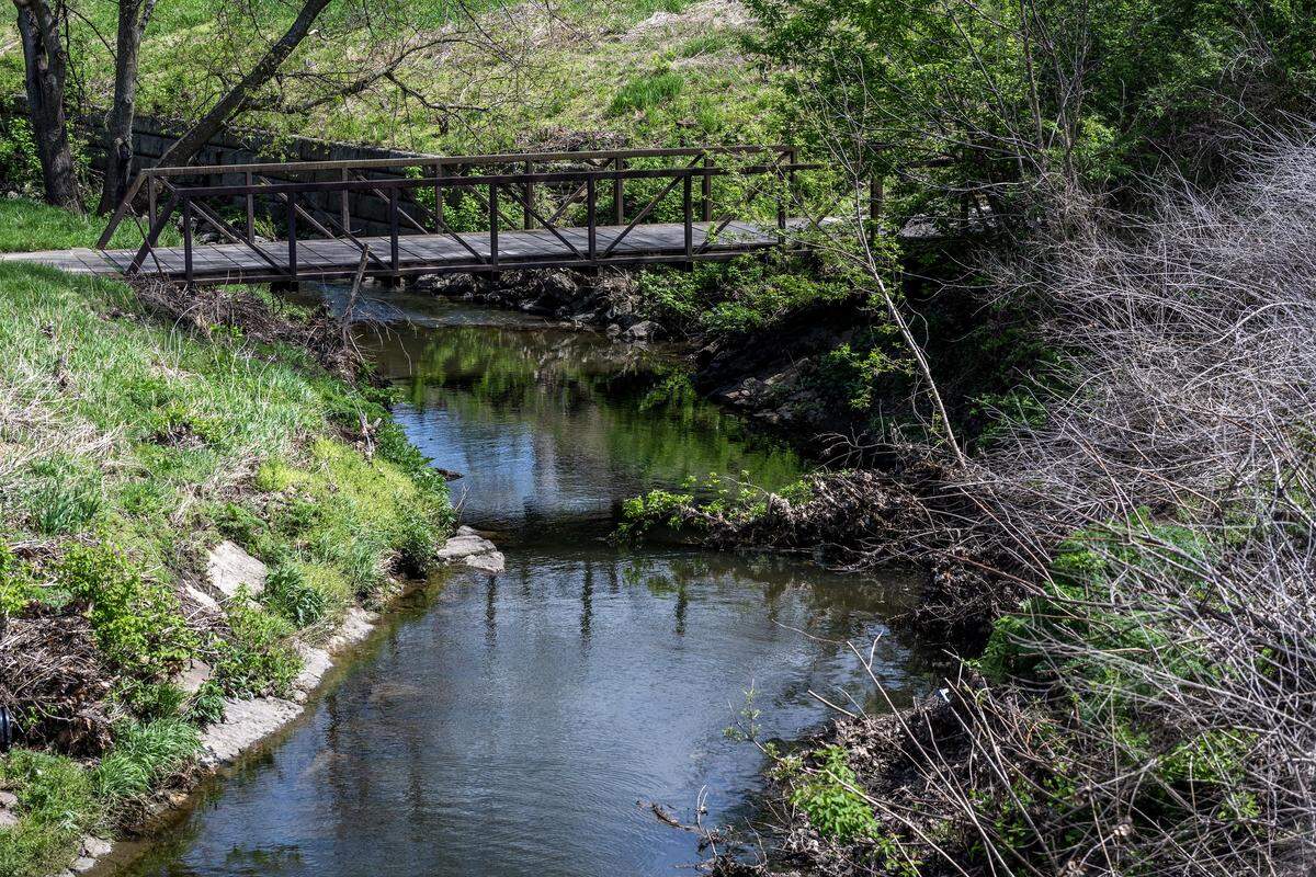 Negro Creek flows along Ironhorse Golf Club on Monday, April 13, 2026, in Leawood.