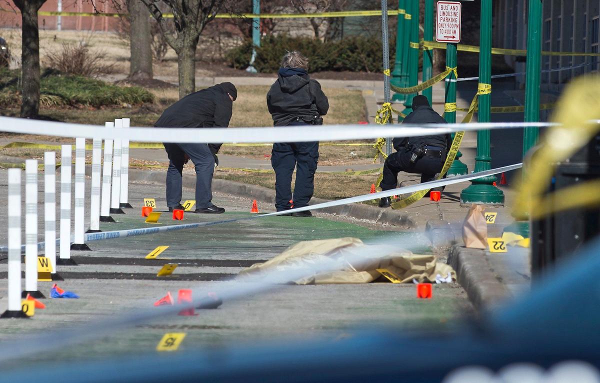 Kansas City police and investigators were on the scene of the shooting Saturday. Police later said they recovered 95 shell casings in the area.