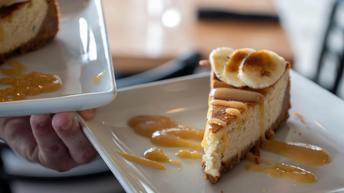 Roots offers a bananas Foster cheesecake with caramelized banana and rum sauce.