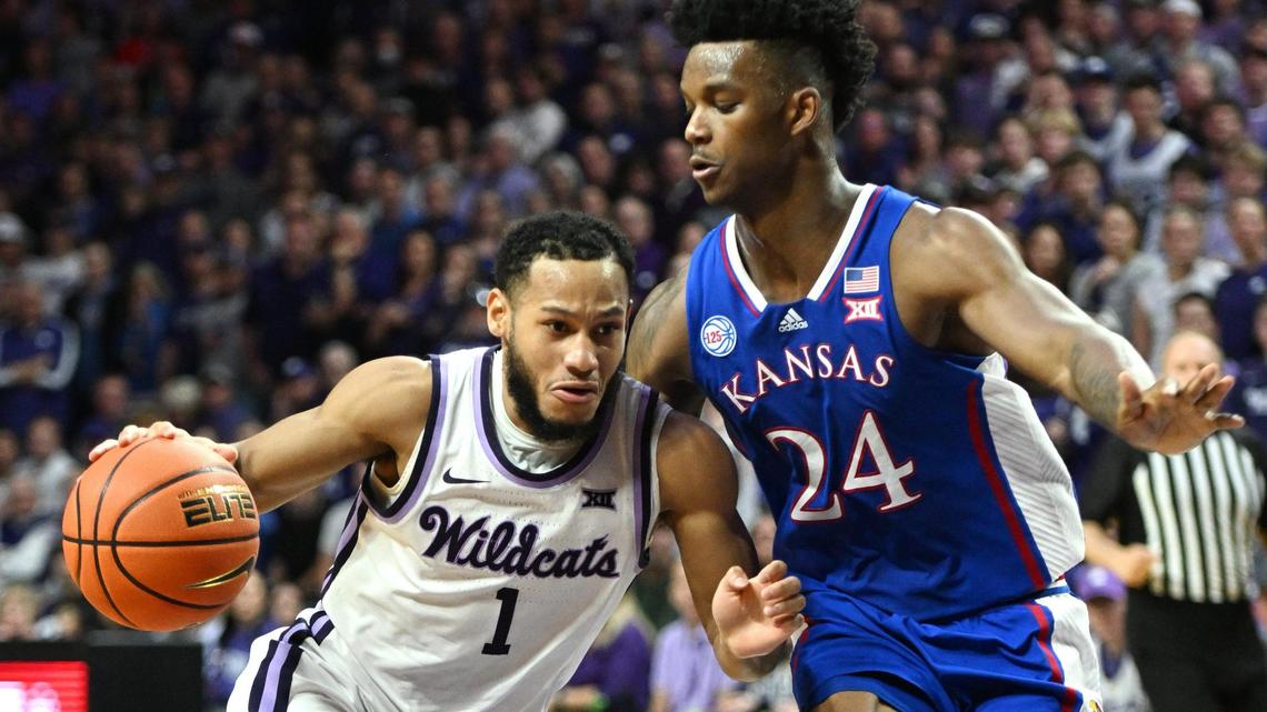 KSU’s Markquis Nowell drives on KU’s KJ Adams during the first half of a 2022-23 Big 12 Conference game at Bramlage Coliseum.