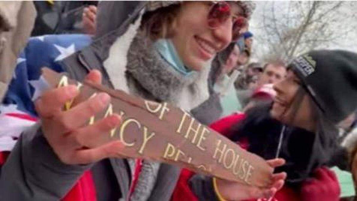 Emily Hernandez of Sullivan, Missouri — seen during the insurrection carrying a wooden name plate torn from House Speaker Nancy Pelosi’s office — was charged federal court in Washington, D.C., in connection with the riot at the U.S. Capitol.