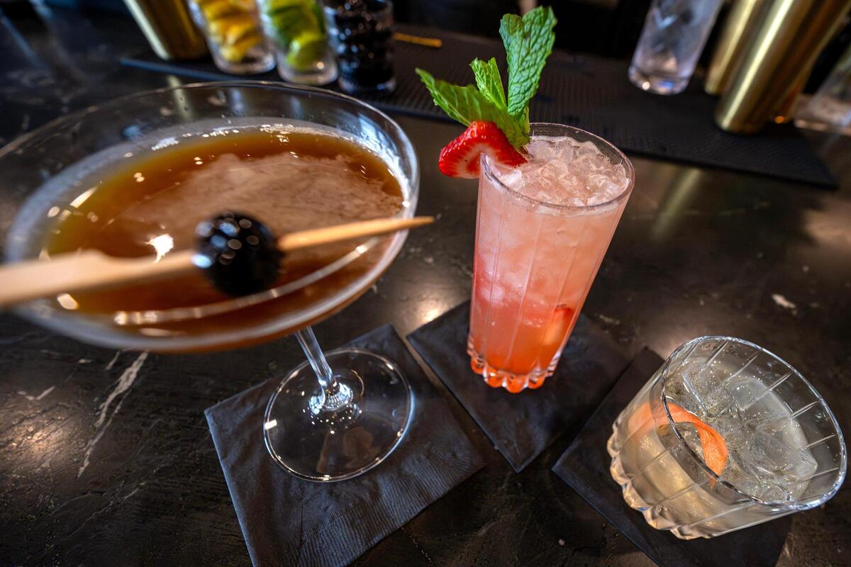 A trio of cocktails is pictured at Gilda’s Bar de Tapas on Thursday, July 17, 2025, in Shawnee. Fig Sidecar, left, Strawberry Smash G&T and Bianco Negroni.