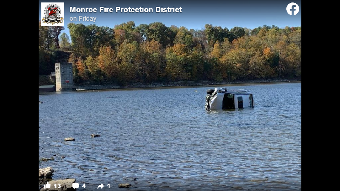 A UPS driver is being credited with helping rescue a motorist who crashed through a guardrail and into Lake Monroe in Indiana, officials say.
