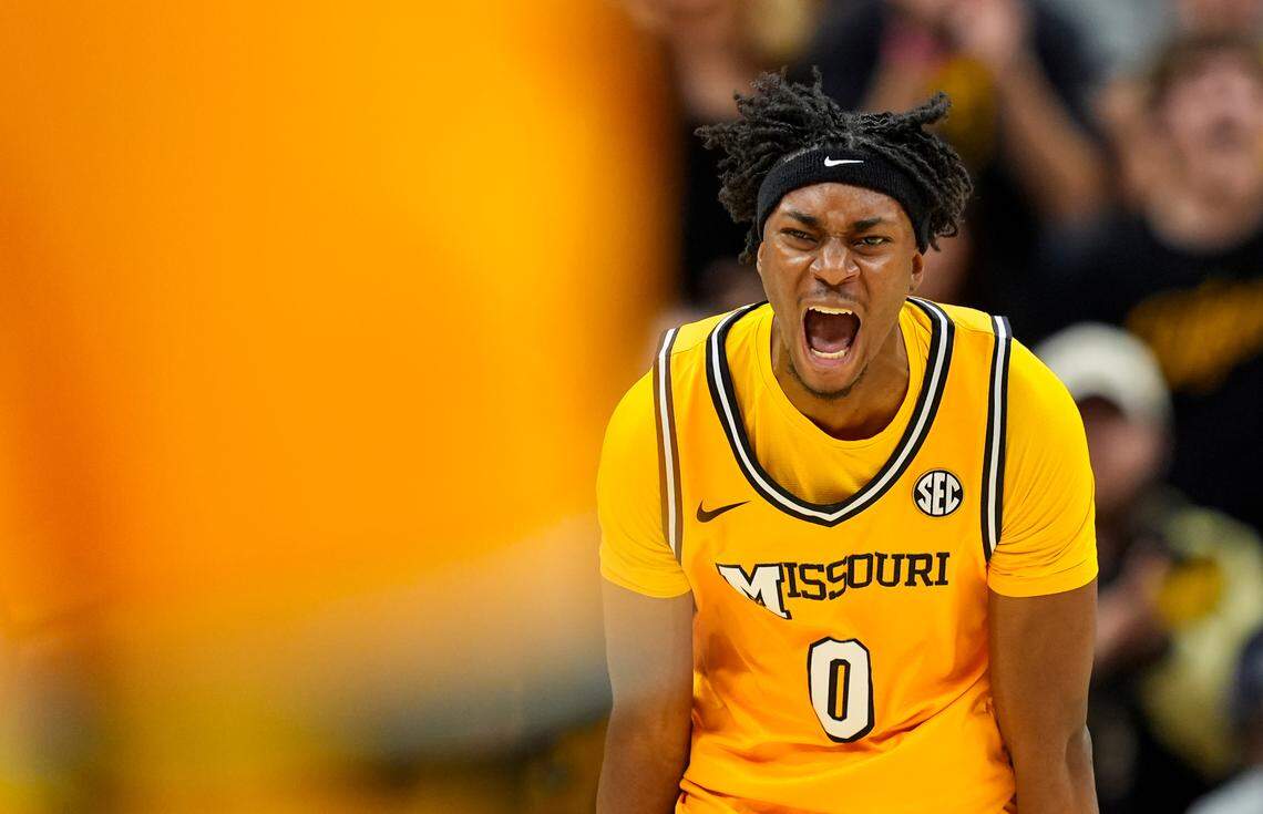 Missouri Tigers guard Anthony Robinson II (0) celebrates after scoring during the first half against the Kansas Jayhawks at Mizzou Arena on Dec. 8, 2024.