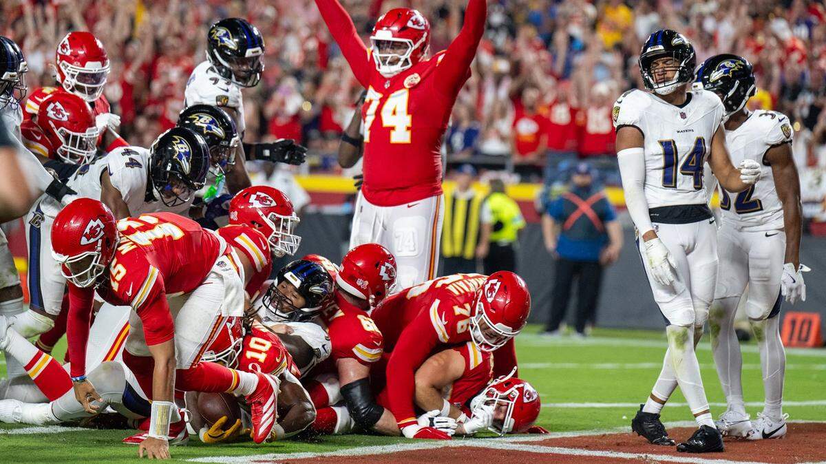 Kansas City Chiefs running back Isiah Pacheco (10) gets in for a touchdown that included quarterback Patrick Mahomes (15) in on the pileup In the second half against the Baltimore Ravens on Thursday, Sept. 5, 2024, at GEHA Field at Arrowhead Stadium. Kansas City defeated Baltimore 27-20.