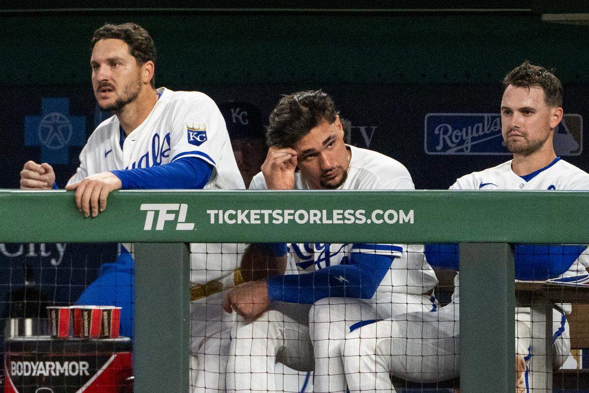 Kansas City Royals players look dejected in the dugout after giving up four runs in the ninth inning against the Boston Red Sox on Tuesday, May 19, 2026, at Kauffman Stadium.