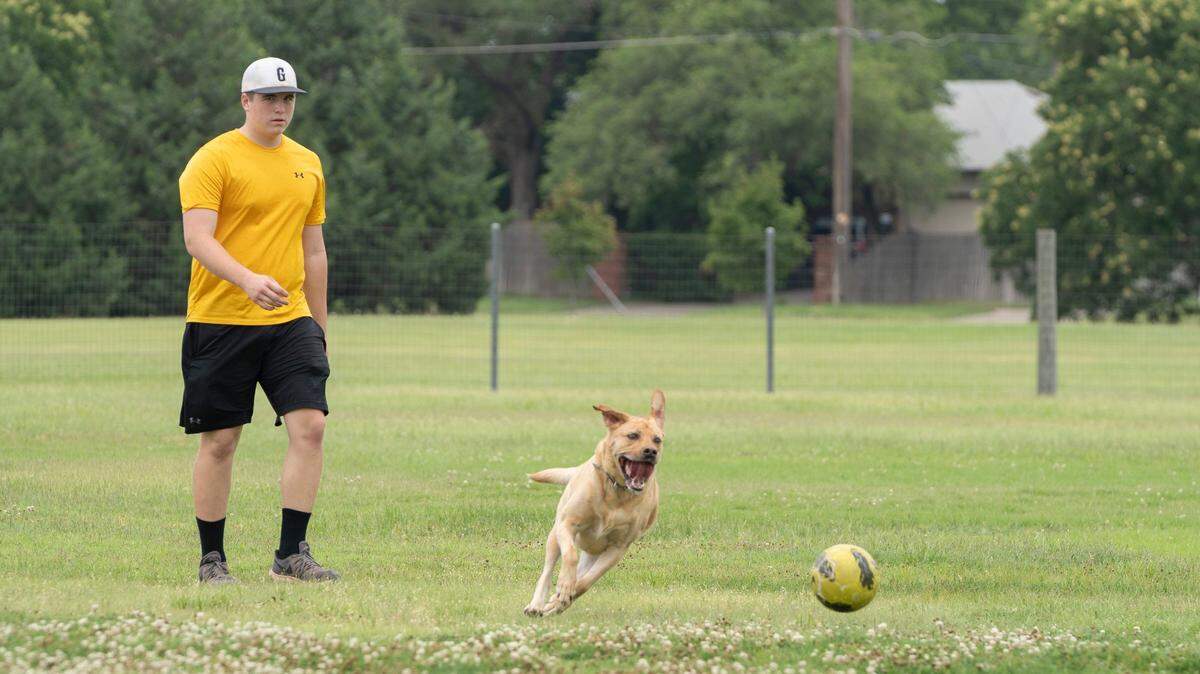 Reece Hembree and his dog, Simba, drove to the dog park at 21st and Meridian. In north-central Wichita, it’s the closest to west Wichita.