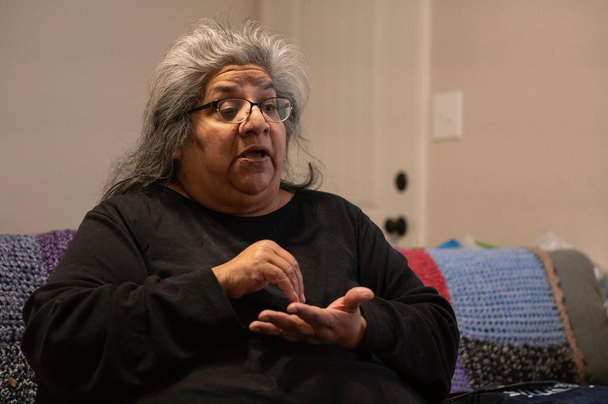 Louise Lynch speaks about becoming the victim of a rental scame on Thursday, Feb. 23, 2023, in Kansas City, Kansas. Lynch lost $1,600 after signing a lease for her home which the property management company says was fraudulent.