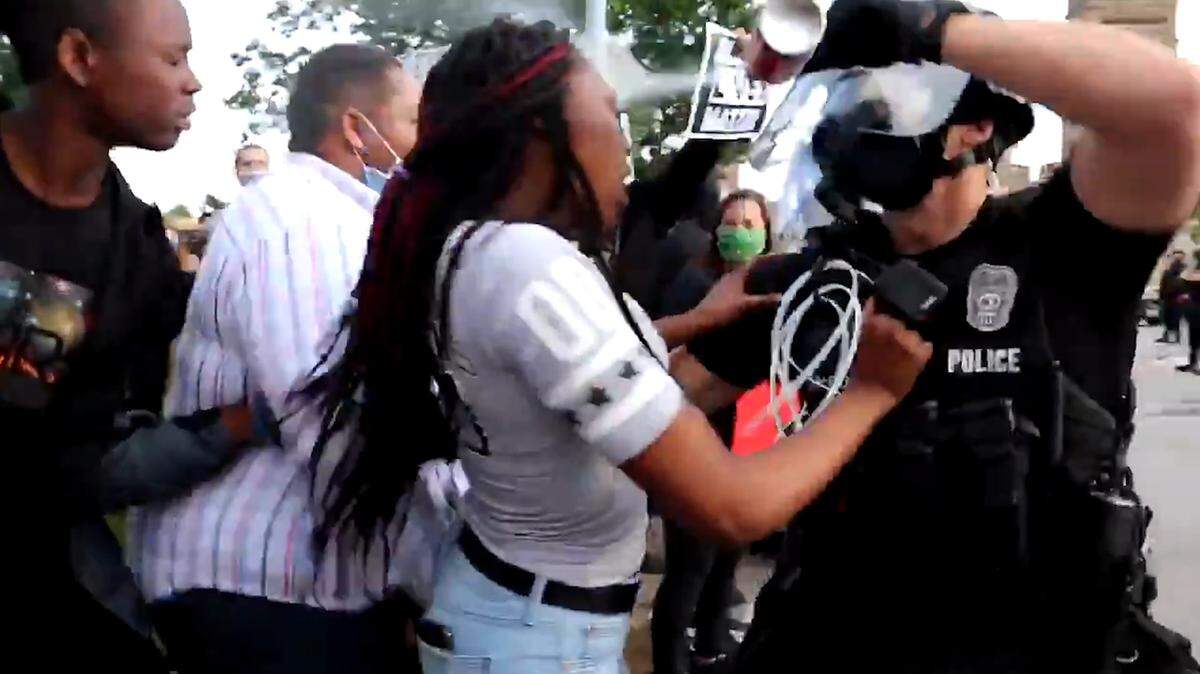 A viral video captured a protester in Kansas City getting pepper sprayed in the face after yelling at police on May 30, 2020.