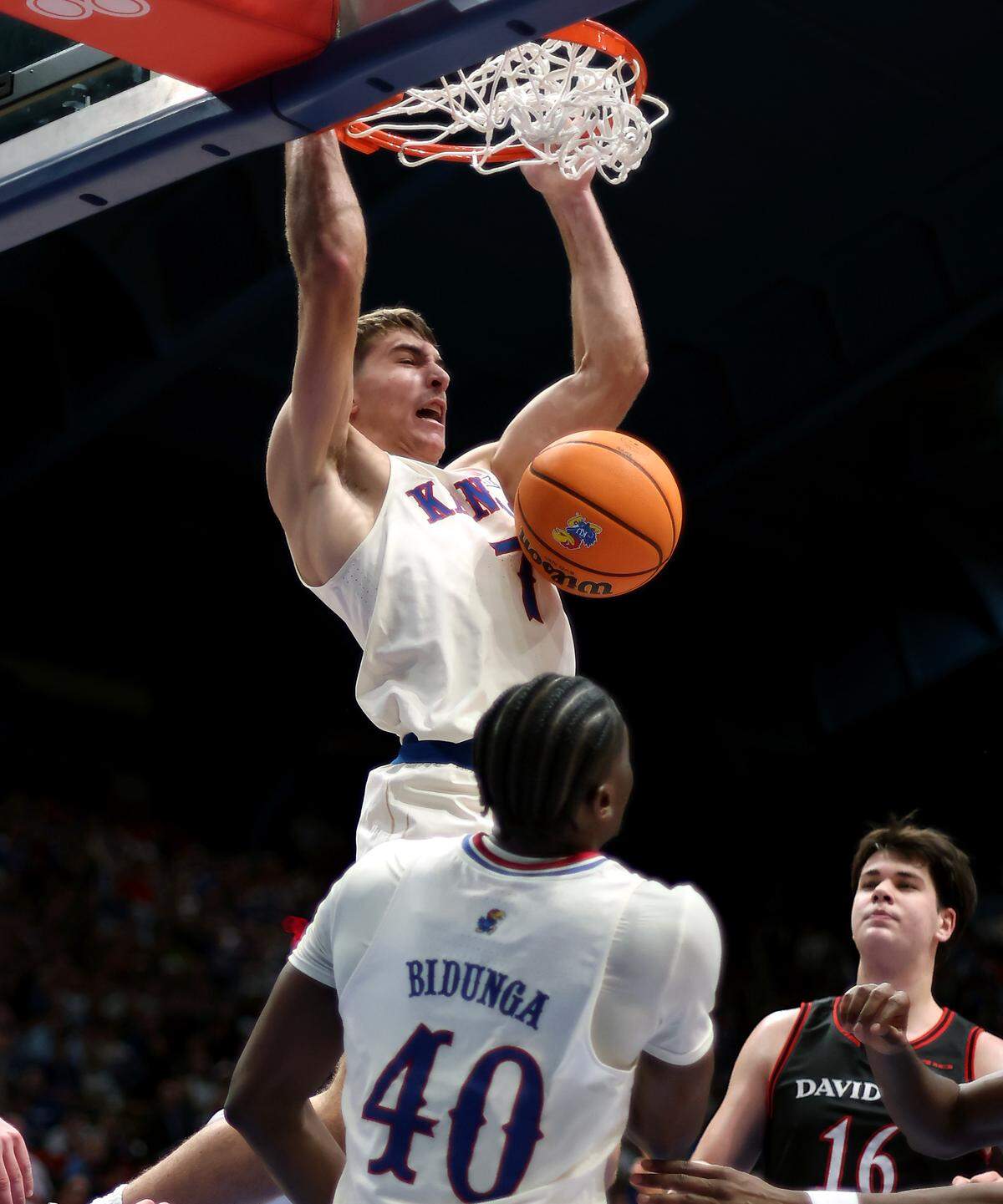 Kohl Rosario #7 of the Kansas Jayhawks dunks during the game against the Davidson Wildcats at Allen Fieldhouse on December 22, 2025 in Lawrence.