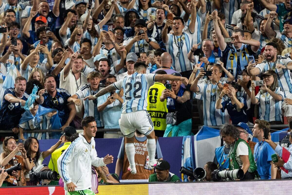 Argentina forward Lautaro Martínez (22) jumps into the stands after scoring a goal in a 2026 FIFA World Cup quarterfinal match at Kansas City (Arrowhead) Stadium in Kansas City on Saturday, July 11, 2026.