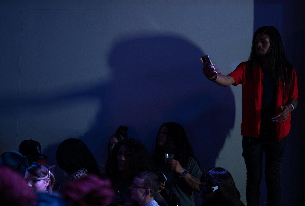 Jose Deanda records a group of performers during the Pride Ball organized by Kansas City Pride Community Alliance at Uptown Theater on June 9, 2023, in Kansas City. Contestants at the Pride Ball competed for cash prizes for each of their respected categories.