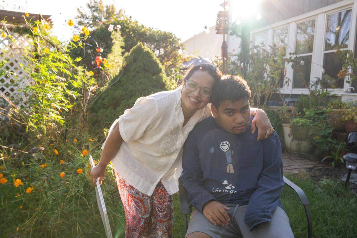 Buddhika Kimmanthudawa with her son, Duvi, at her in-home, licensed Montessori school on Thursday, October 16, 2025, in Leawood. Kimmanthudawa is facing legal threats from her HOA because of parking, traffic complaints and HOA is claiming that she can't operate a business in the HOA.