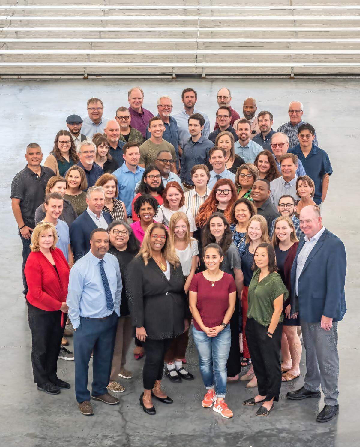Newsroom employees of The Kansas City Star pose for a photo in 2023.