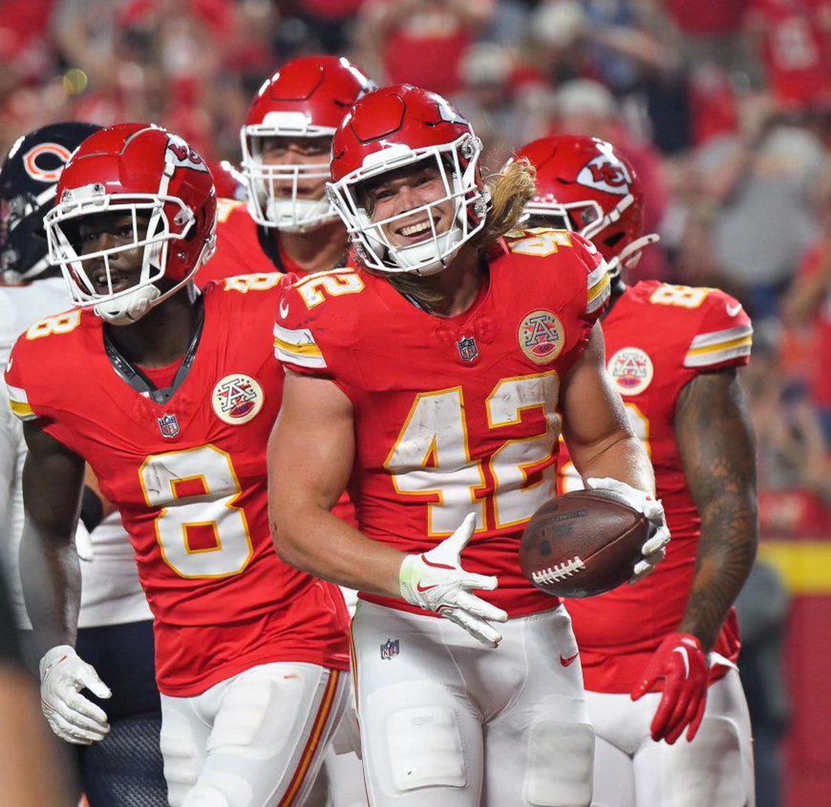 Kansas City Chiefs running back Carson Steele (42) had a big smile after running in a touchdown in the second quarter Thursday, Aug. 22, 2024, against the Chicago Bears at GEHA Field at Arrowhead Stadium.