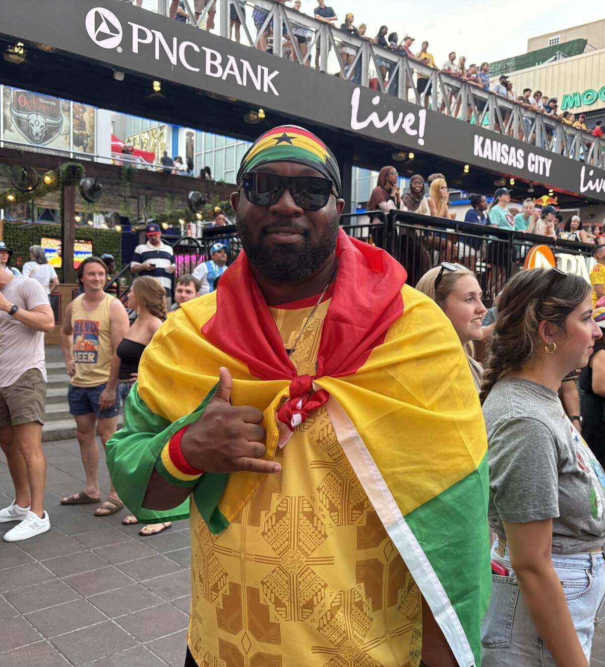 Brian Kubi wore a Ghana flag inside Kansas City’s Power and Light District. The Los Angeles resident came to Kansas City to support the Black Stars. June 3, 2026.