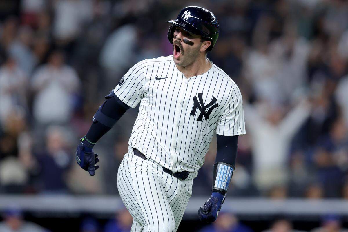 Yankees catcher Austin Wells lets out a shout while rounding the bases after hitting a game-changing three-run homer off reliever James McArthur in the seventh inning of Monday night’s game at Yankee Stadium in New York.