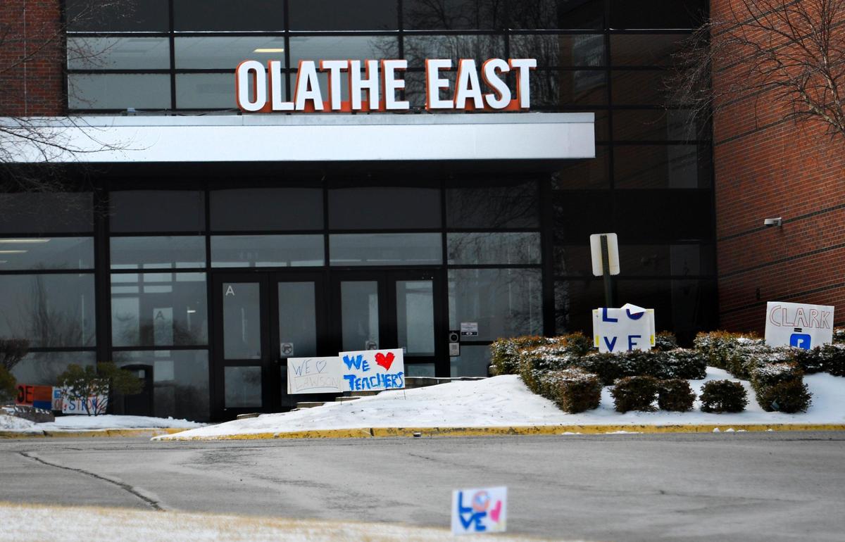 Students returned to school where signs of support dotted the entryway at Olathe East High School on Monday, March 7, 2022, in Olathe. On Friday, a shooting at the school wounded a school administrator, a school resource officer and a student. Jaylon Desean Elmore, a 18-year-old Olathe East High School student has been charged with attempted capital murder after allegedly shooting a school resource officer Friday, court documents said. Jaylon Desean Elmore was charged Saturday in Johnson County District Court.