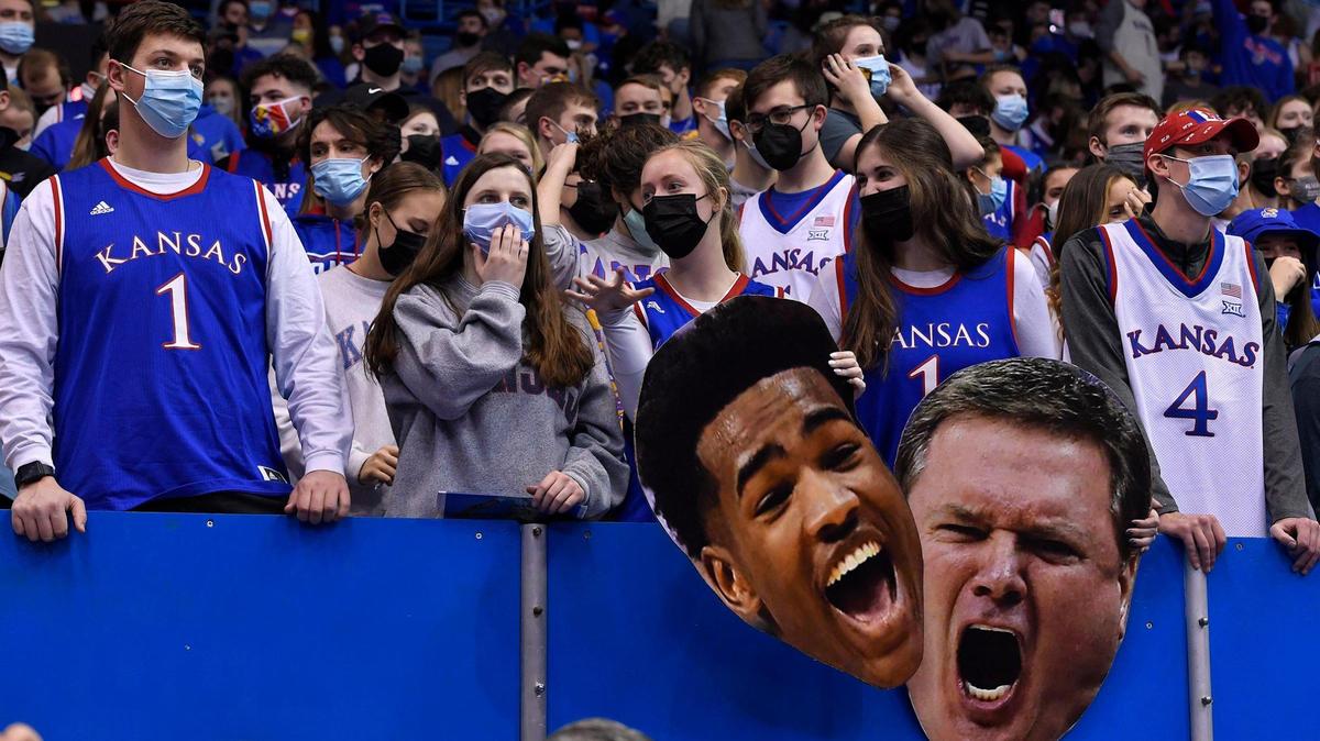 Masks are once again required at Allen Fieldhouse for KU Jayhawks basketball games. Fans in the student section wore them at Tuesday night’s men’s game against Iowa State.