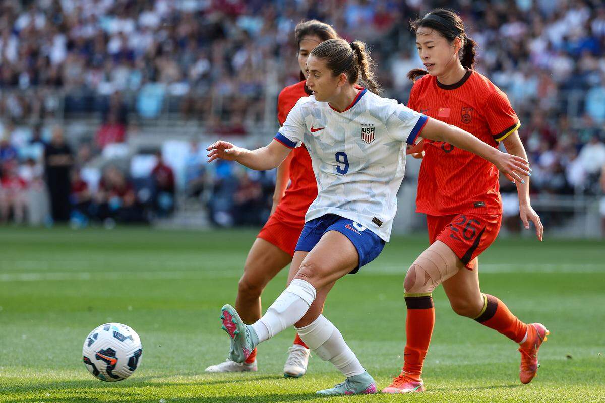 U.S. Women's National Team forward Ally Sentnor (9) passes the ball as China PR goalkeeper Zhi Jie (26) and defender Chen Qiaozhu (3) defend during the second half at Allianz Field on May 31, 2025.