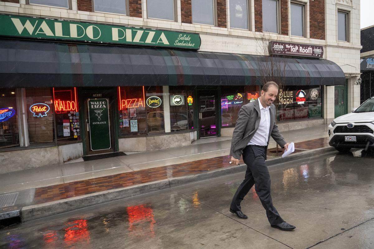 Whitney VinZant, chief executive officer of W. VinZant Restaurants leaves Waldo Pizza, one of his restaurants.