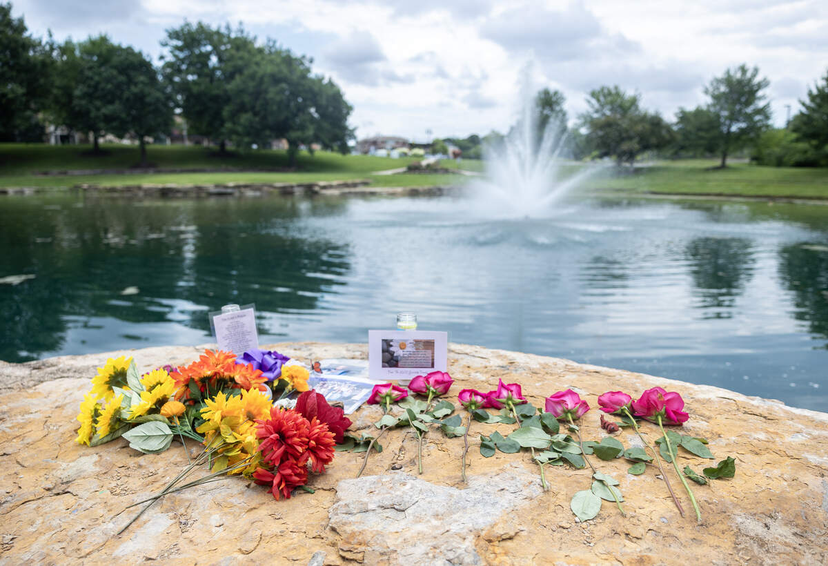 A small memorial was set up at a pond in Kansas City’s Briarcliff neighborhood, where the body of 10-year-old Jackson Georgari was found on Thursday, July 9.