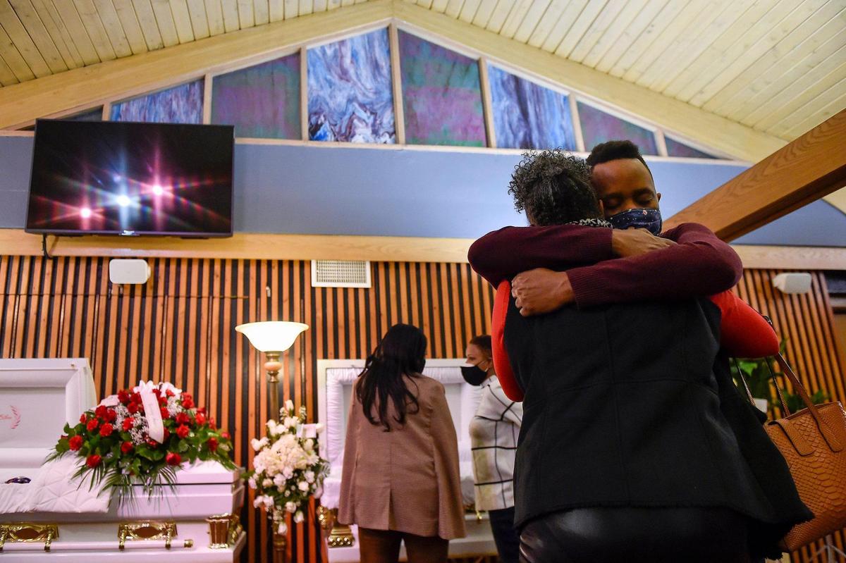 Kenneth and Etta McKenzie were shot and killed in their Raytown home on Jan. 13, 2021. Throughout their lives together, the McKenzies were there for anyone who needed help, according to their children. The McKenziesÕ son Kenneth McKenzie Jr. hugs his aunt Wanda Kinney during the visitation at Eley & Sons Funeral Chapel Thursday, Jan. 21, 2021.