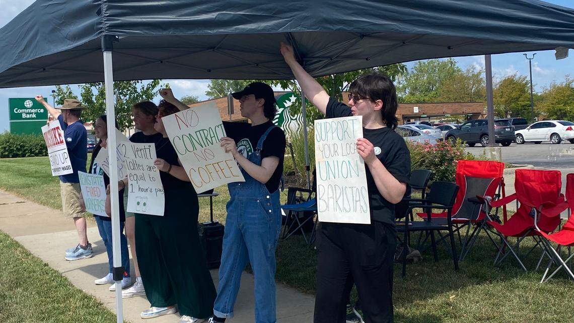 Starbucks employees go on strike outside the store in Independence, Missouri, Saturday Sept. 3, 2022, in protest of working conditions and understaffing.