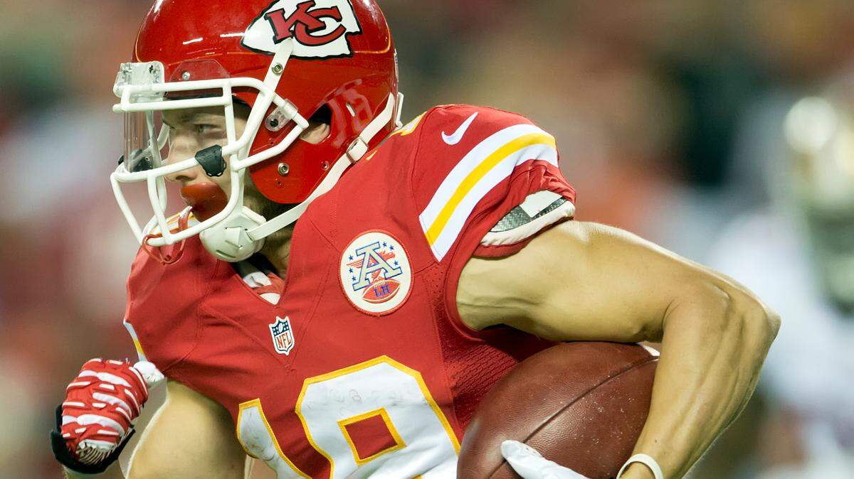 Kansas City Chiefs wide receiver Devon Wylieran past diving San Francisco 49ers punter Colton Schmidt for a 52-yard return in a 2013 preseason game at Arrowhead Stadium.