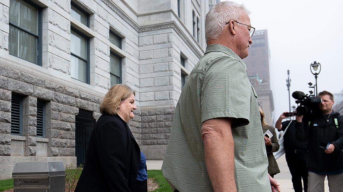 Milwaukee County Circuit Judge Hannah Dugan (left) leaves the Milwaukee Federal Building and U.S. Courthouse on May 15.
