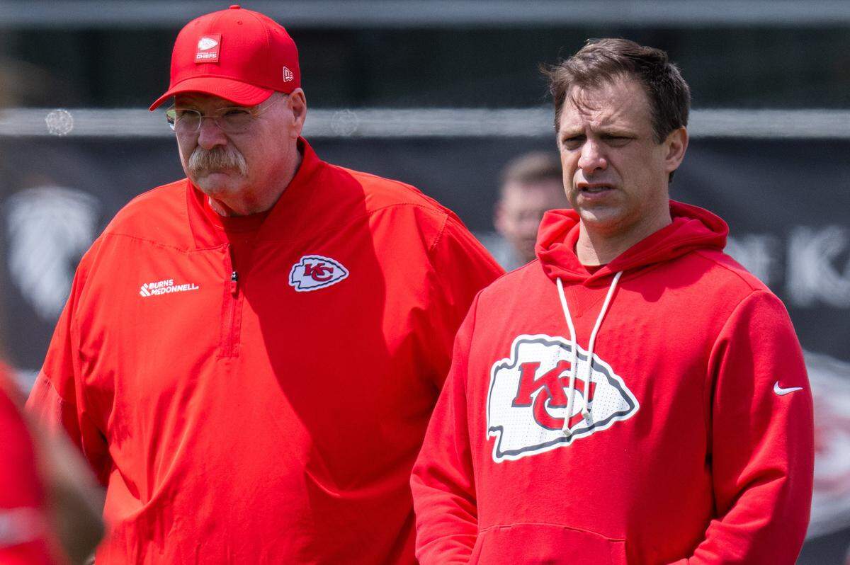 Kansas City Chiefs head coach Andy Reid and general manager Brett Veach watch players run drills during Chiefs mini camp on Friday, May 1, 2026.
