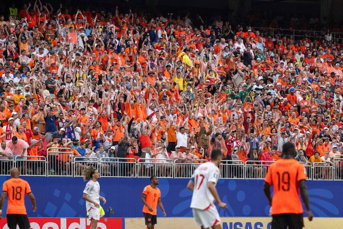 Fans do the wave in a FIFA World Cup group-stage soccer match at Kansas City (Arrowhead) Stadium in Kansas City on Thursday, June 25, 2026.