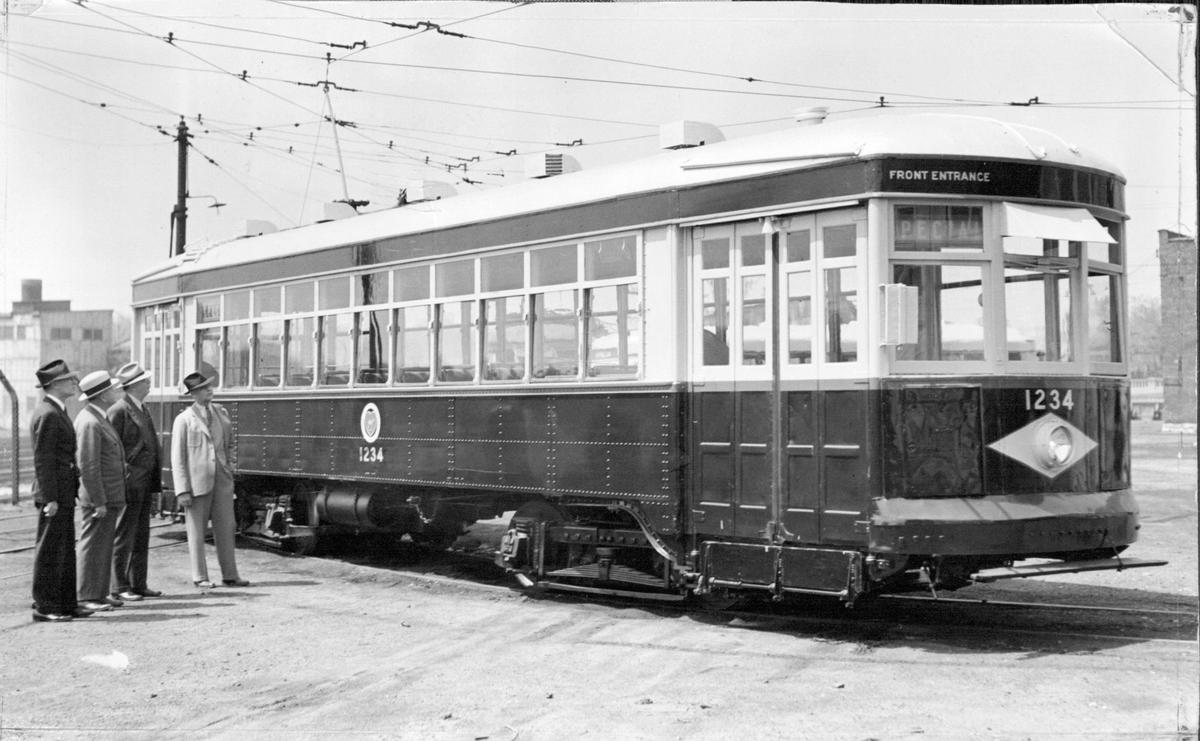 Fresh from a paint shop test in 1937, this street car passed approval with a royal blue body, sage green window trim and panels, and a silver roof, narrow red stripes separating the three major colors that would go on to be used on future Kansas City busses and street cars.
