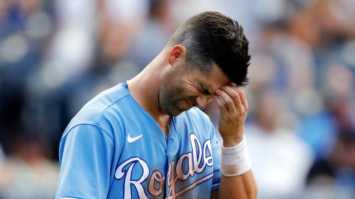 Kansas City Royals’ Whit Merrifield reacts after striking out in the seventh inning of the team’s baseball game against the Boston Red Sox at Kauffman Stadium in Kansas City, Mo., Saturday, June 19, 2021. (AP Photo/Colin E. Braley)